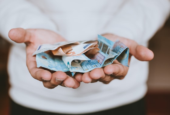 Cash held out in hand